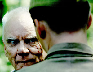 Malcolm McDowell in Evilenko di David Grieco